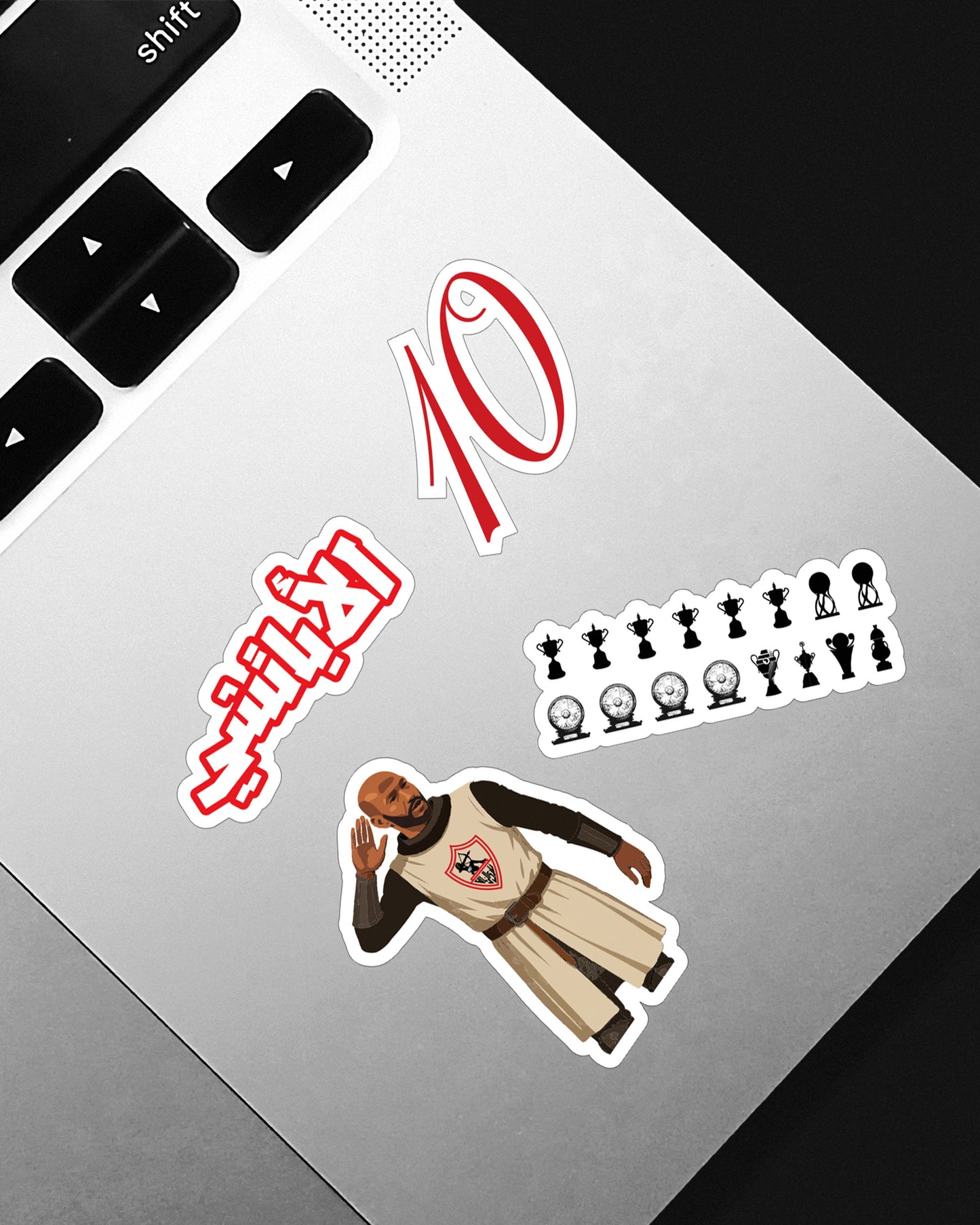 FANKOO The White Knight sticker pack with football culture designs applied to a laptop surface.